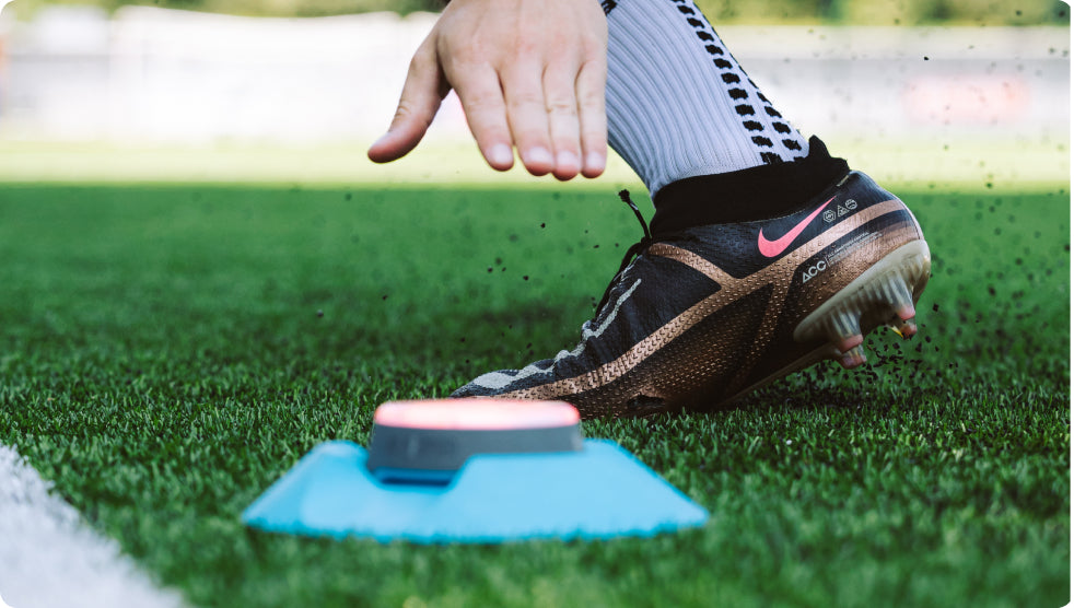 A soccer player tapping out a Pod