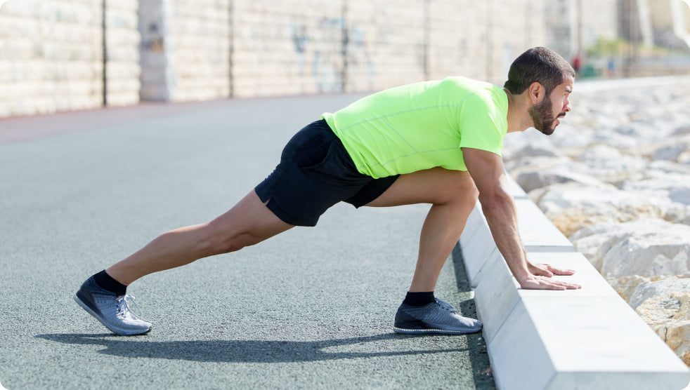 A man warming up his full body before a workout