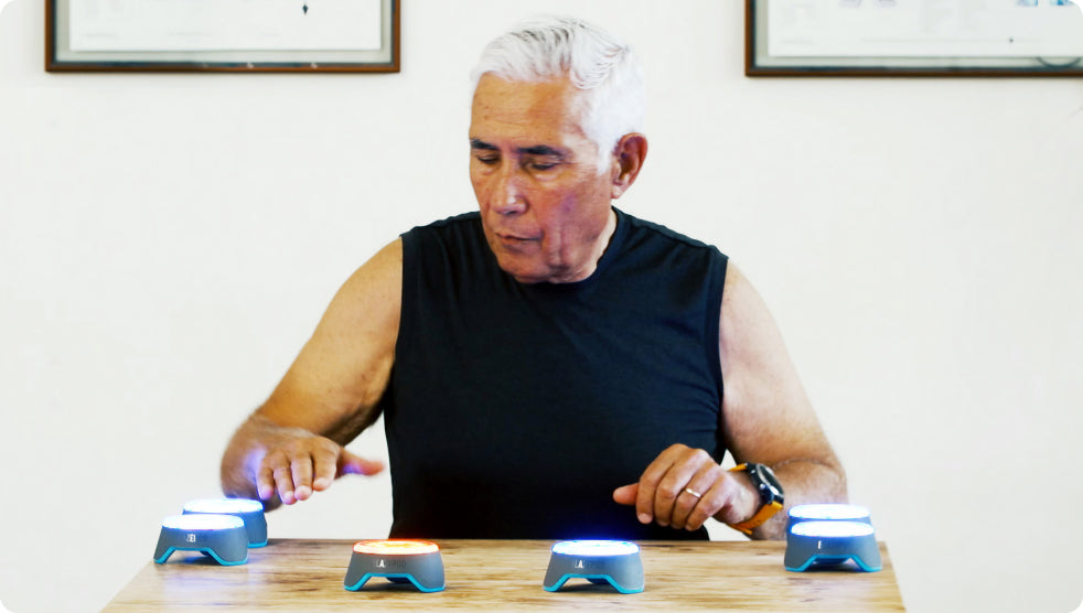 A physical therapist manually helping a patient with their back pain