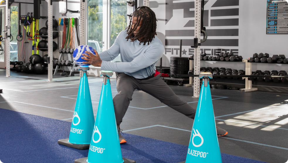 An athlete using BlazePod cones to lightly workout