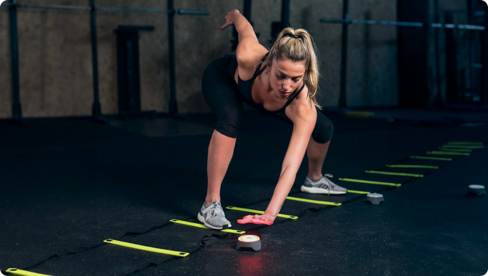 A woman using BlazePod to train