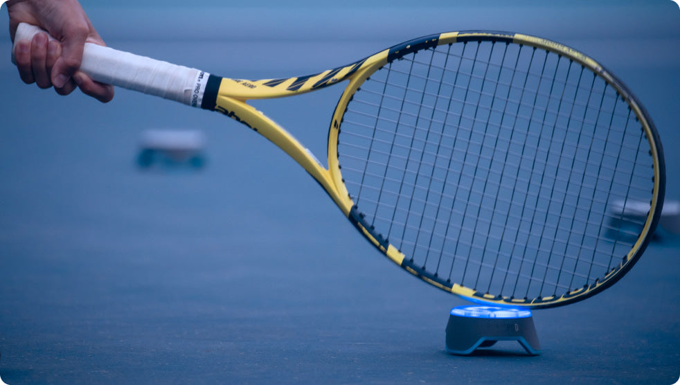 A tennis racket hitting a Pod