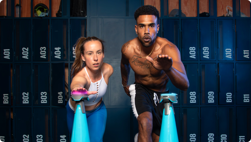 Two athletes tapping out a Pod light on top of a cone and cone adapter